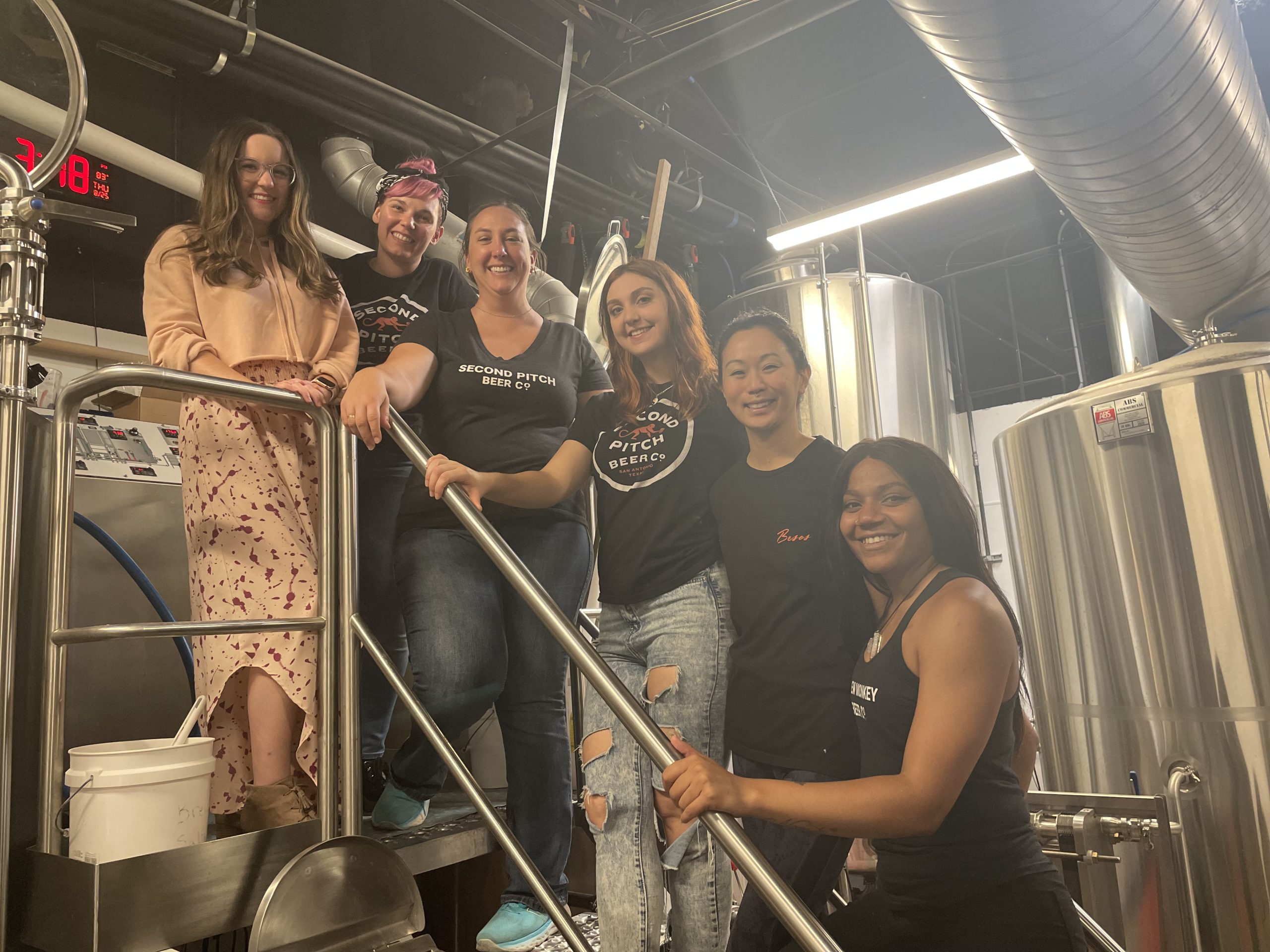 6 women on brew deck stairs